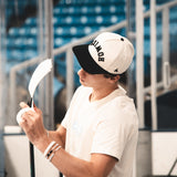 The Backhand Lid Hats Howies Hockey Tape