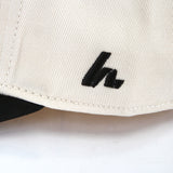 The Backhand Lid Hats Howies Hockey Tape