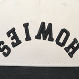 The Backhand Lid Hats Howies Hockey Tape