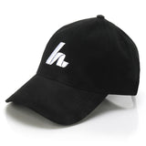 The Hat Trick Lid Hats Howies Hockey Tape Black