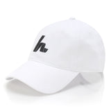 The Hat Trick Lid Hats Howies Hockey Tape White