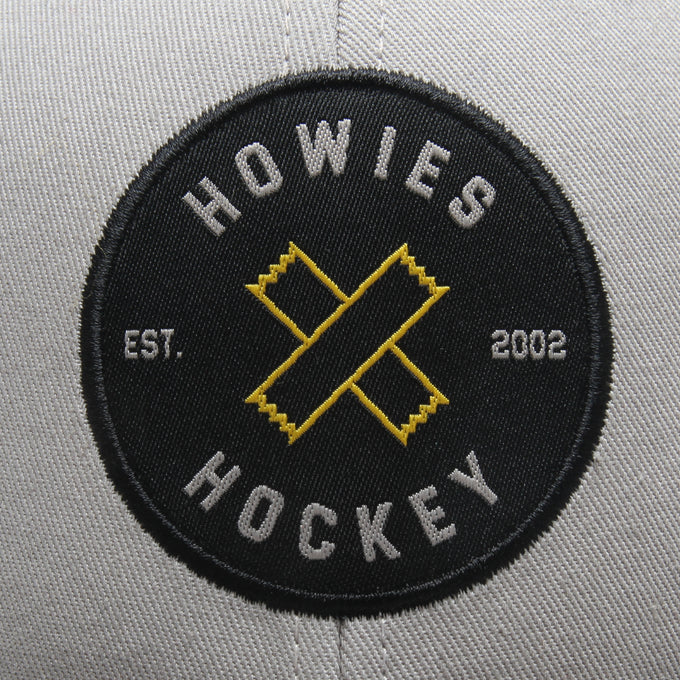 The Cross-Check Lid Hats Howies Hockey Tape