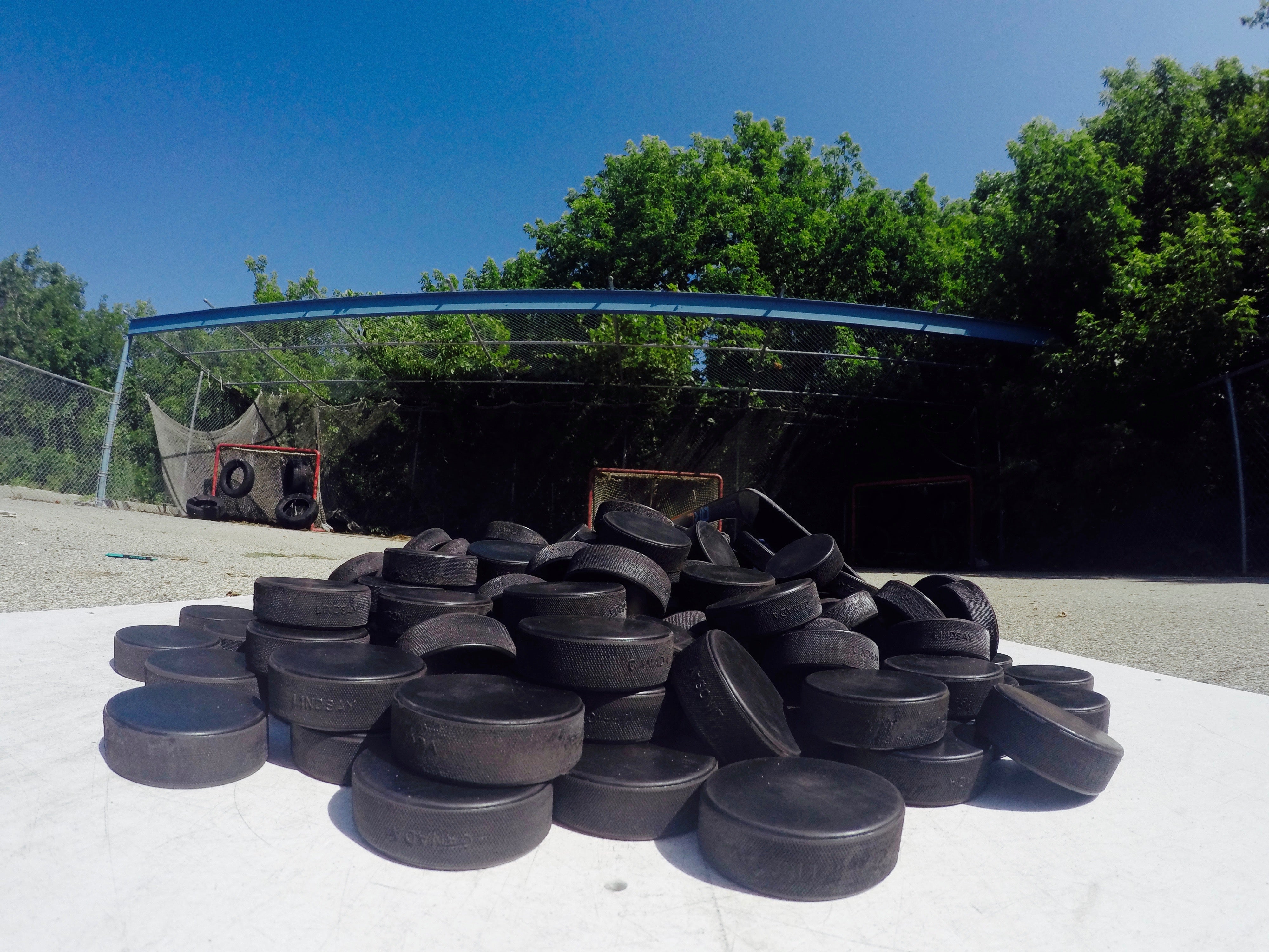 Shop Bulk Hockey Pucks | Howies Hockey Tape