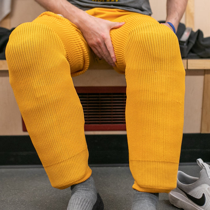 Yellow knit socks on a hockey player