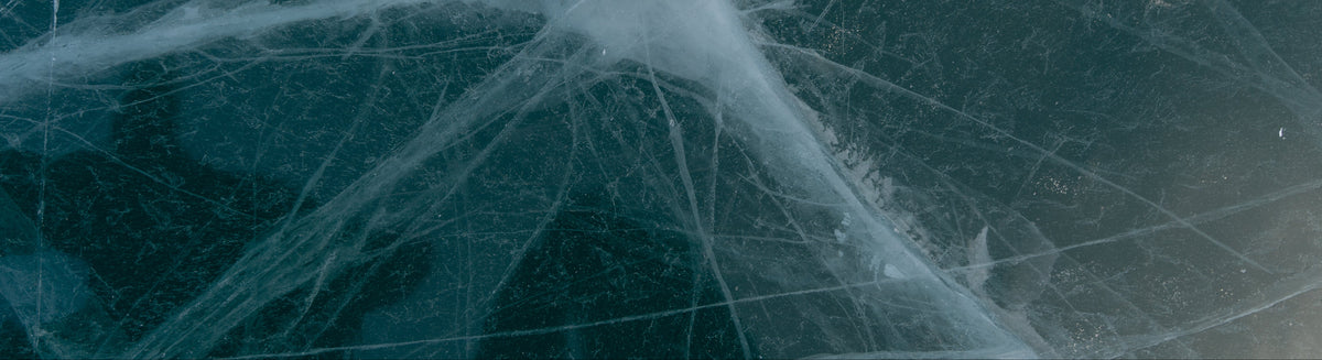 cracked ice on a pond